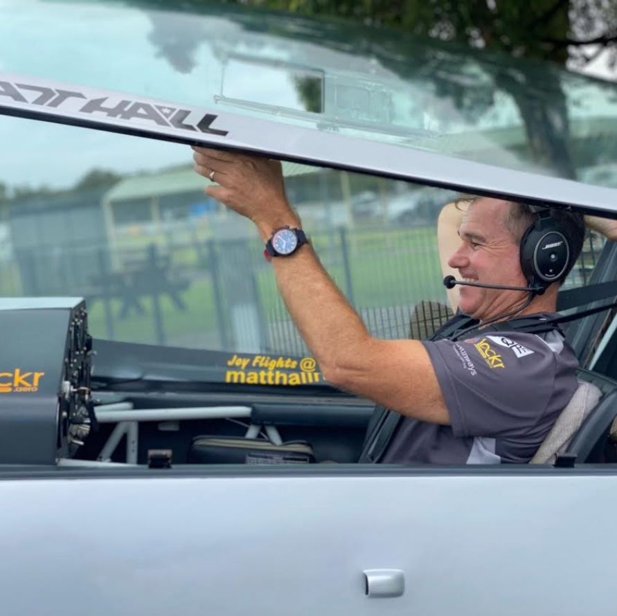 Stunt RAAF pilot Matt Hall in aircrafy cockpit wearing RAAF Air Force 2021 centenary Aviator anti-magnetic  watch 