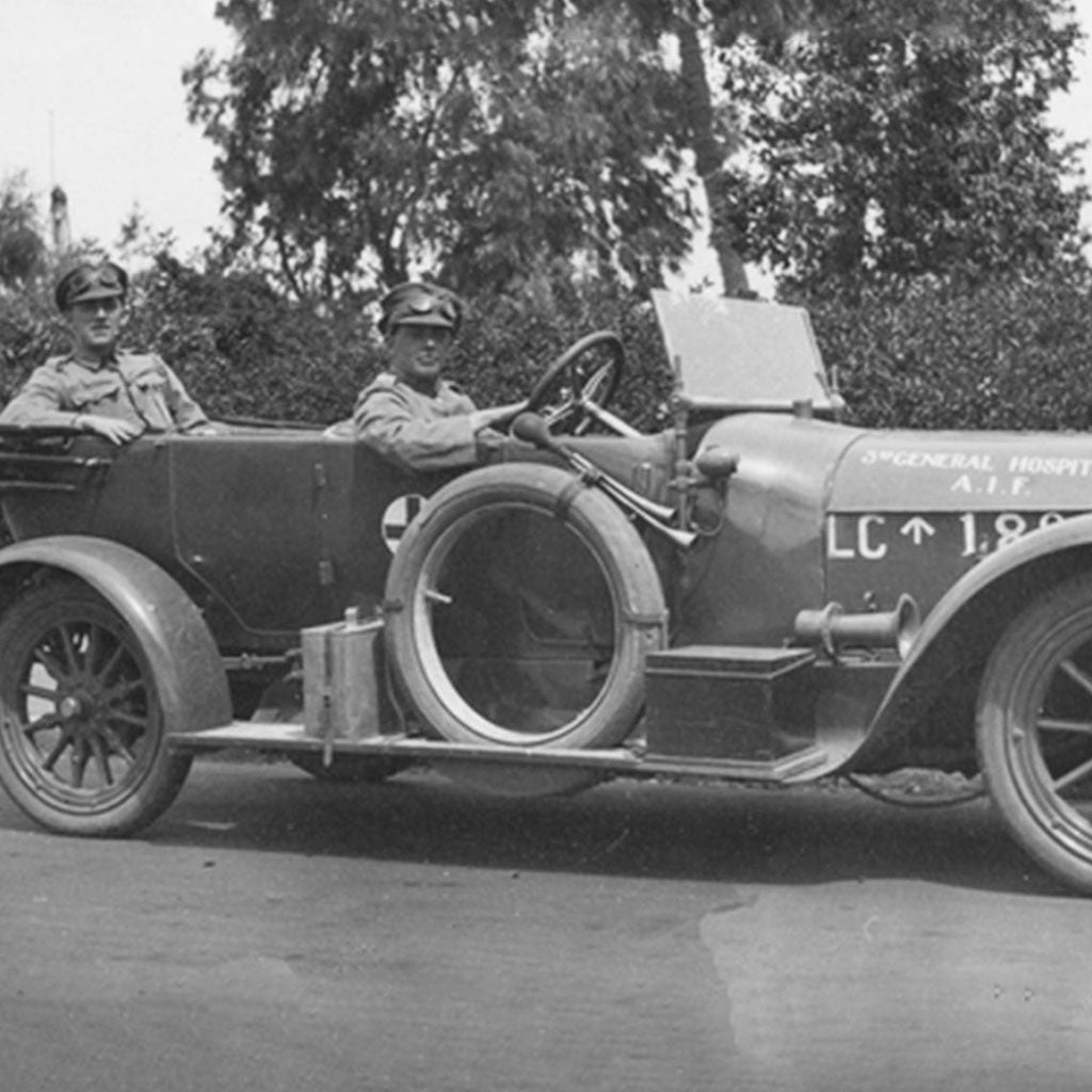 Black and white image of an old vehicle with the broad arrow mark of ordnance. The RAAF Air Force watches have the same broad arrow mark.
