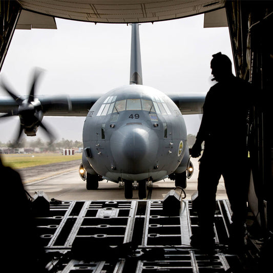 View of a RAAF Hercules C-130H from the view of the cargo hold of another military transport aircraft