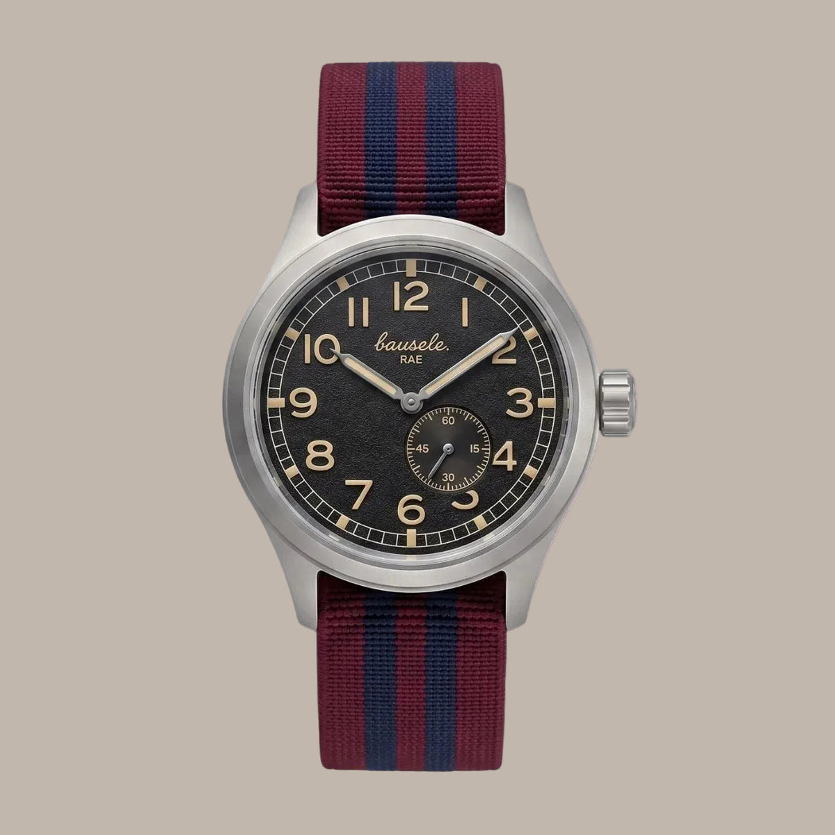 Watch with a red and blue striped strap on a white background